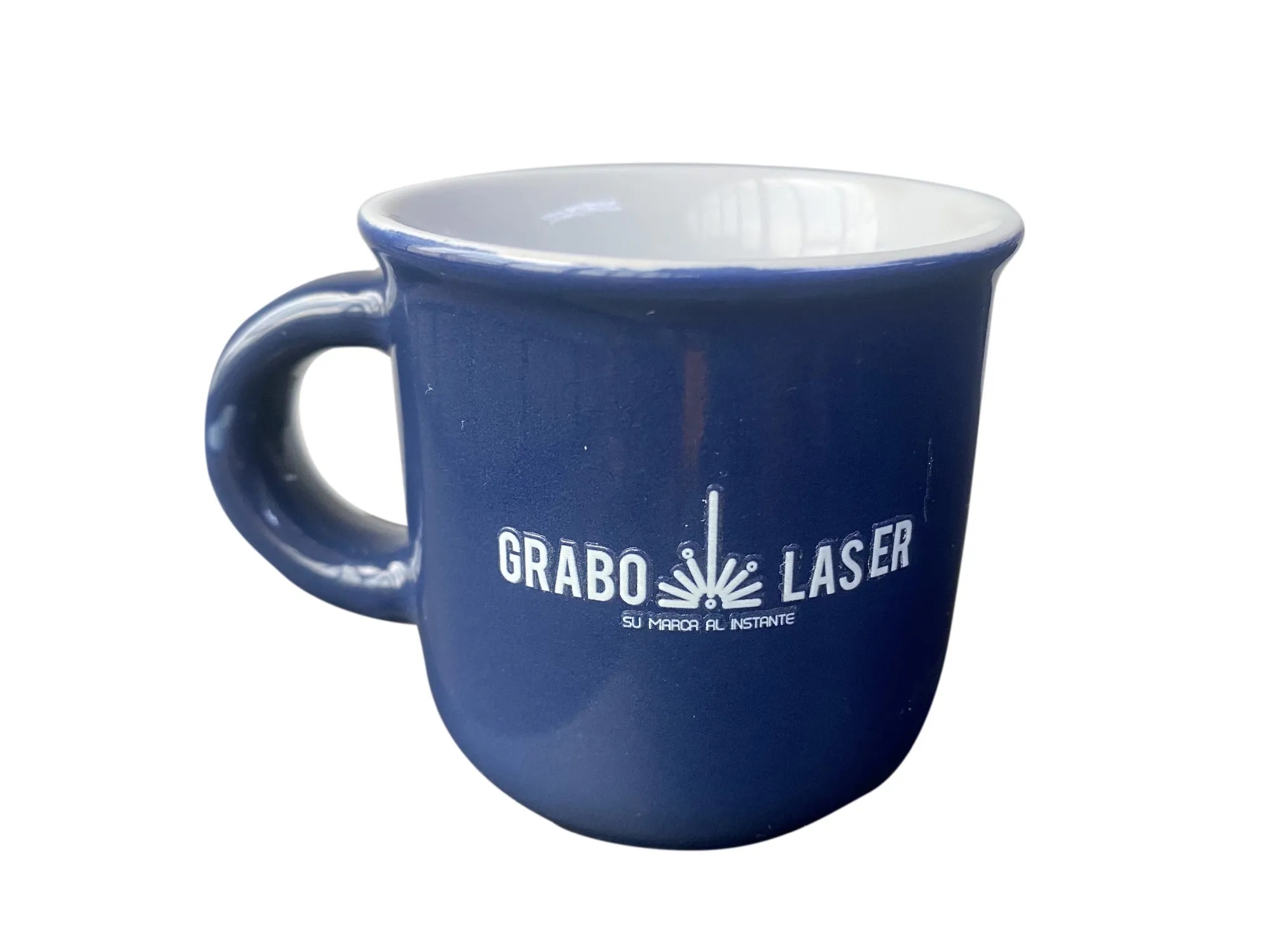 Pocillo de cerámica azul con el logo de Grabolaser en blanco, impreso en DTF UV